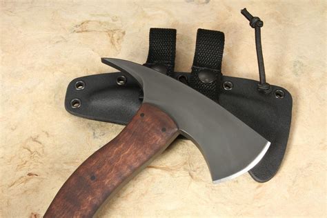 25-inch 80CRV2 carbon steel blade with flat grinds. . Winkler wild bill axe